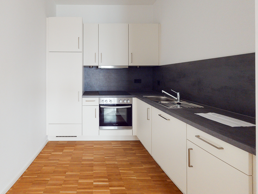 Charmante 2-Zimmer-Wohnung mit Einbauküche in urbaner Lage - Foto 4