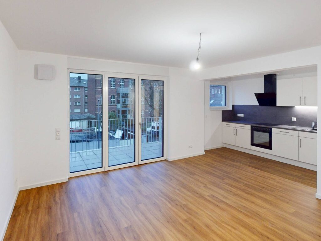 Einziehen und Wohlfühlen: 3-Zimmer-Wohnung mit EBK und Balkon - Foto 2