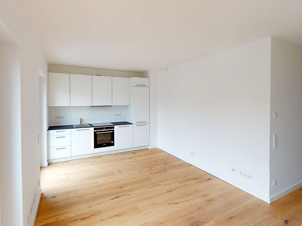 Erstbezug: Kompakte 3-Zimmer-Wohnung mit hochwertiger Einbauküche - Foto 1