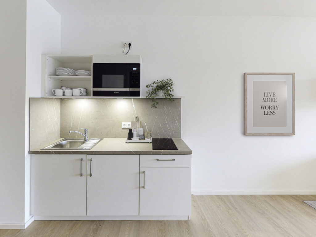 Teilmöbliertes 1-Zimmer-Apartment mit Einbauküche und Balkon - Foto 2