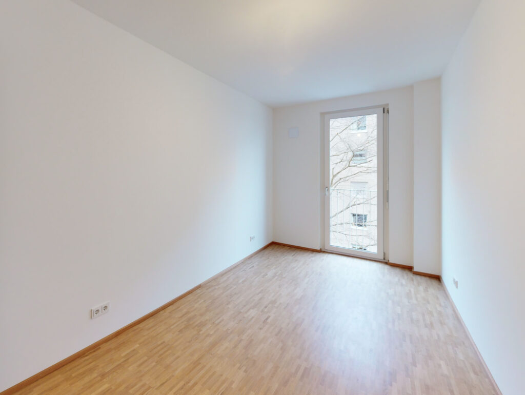 Ein Neubau für das Leben im Quartier mit großzügigem Wohnbereich und Balkon - Photo 1
