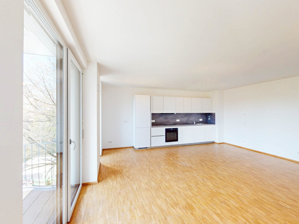 Ein Neubau für das Leben im Quartier mit großzügigem Wohnbereich und Balkon - Photo 2
