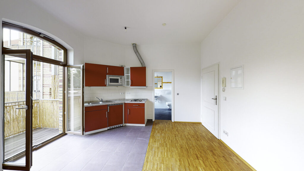 Bezaubernde 1,5-Zimmer-Wohnung mit Einbauküche und Balkon - Photo 1