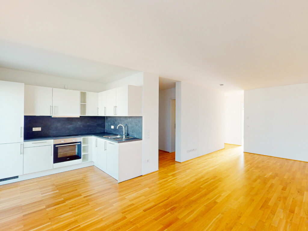 Modern geschnittene 4-Zimmer-Erdgeschosswohnung mit 2 Bäder und EBK - Foto 2