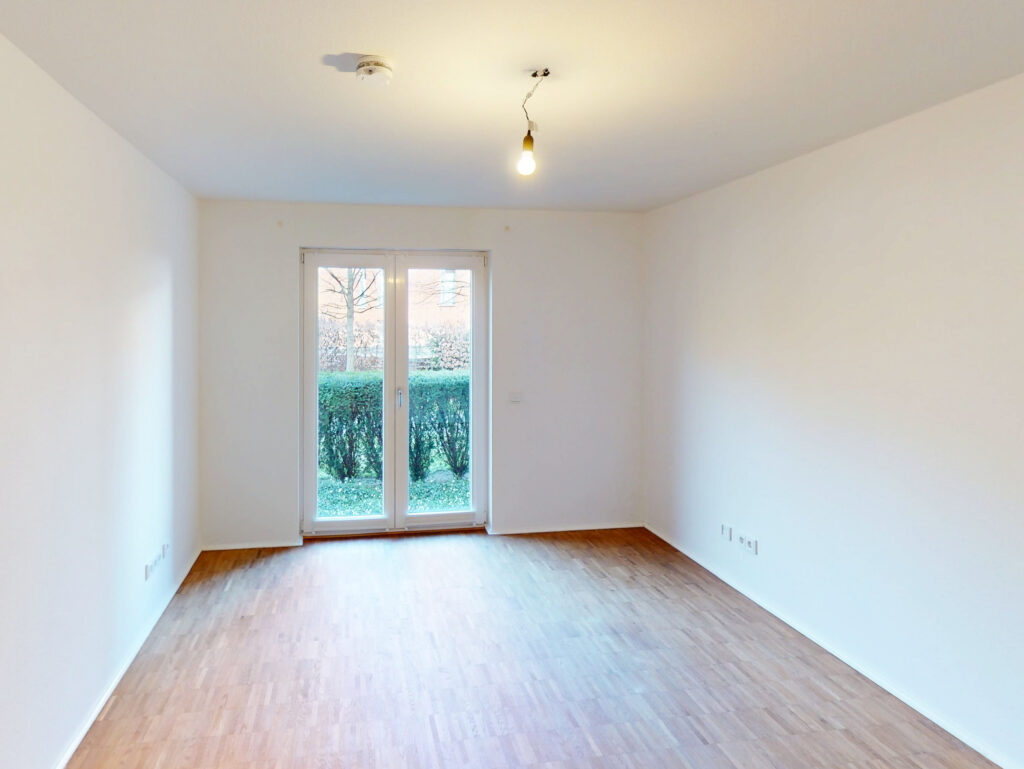 Praktisch geschnittene 3-Zimmer-Wohnung mit Terrasse und Garten - Photo 1