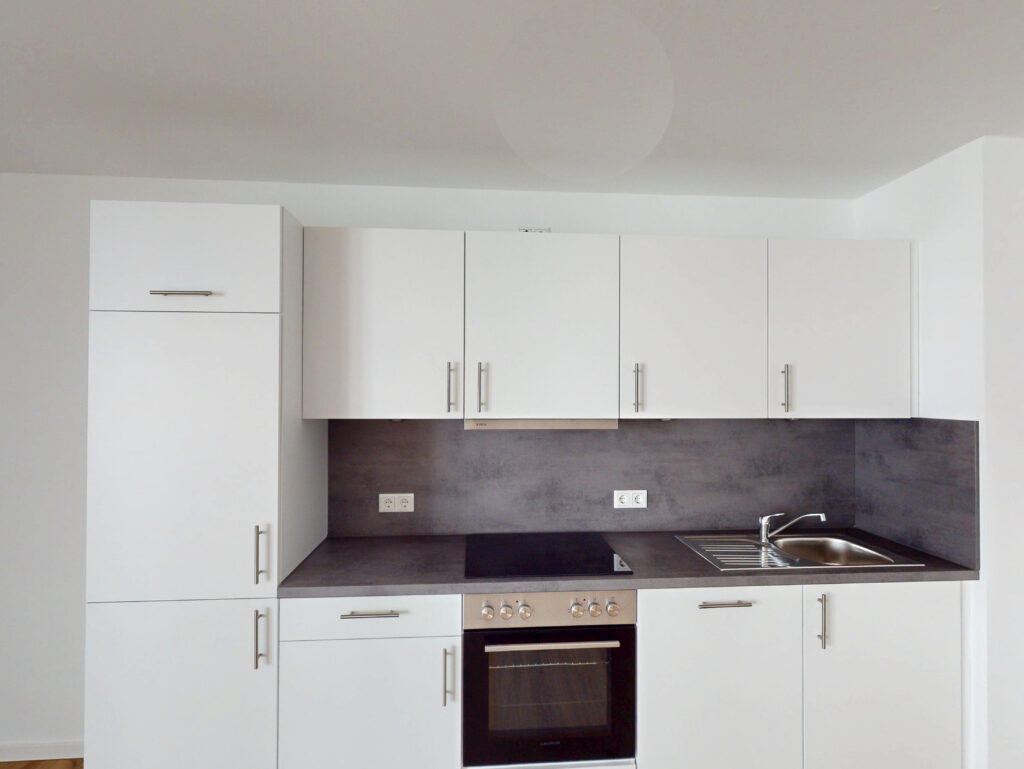 *UMZUGSBONUS* Gemütliche 2-Zimmern-Neubauwohnung mit EBK und Balkon - Photo 3