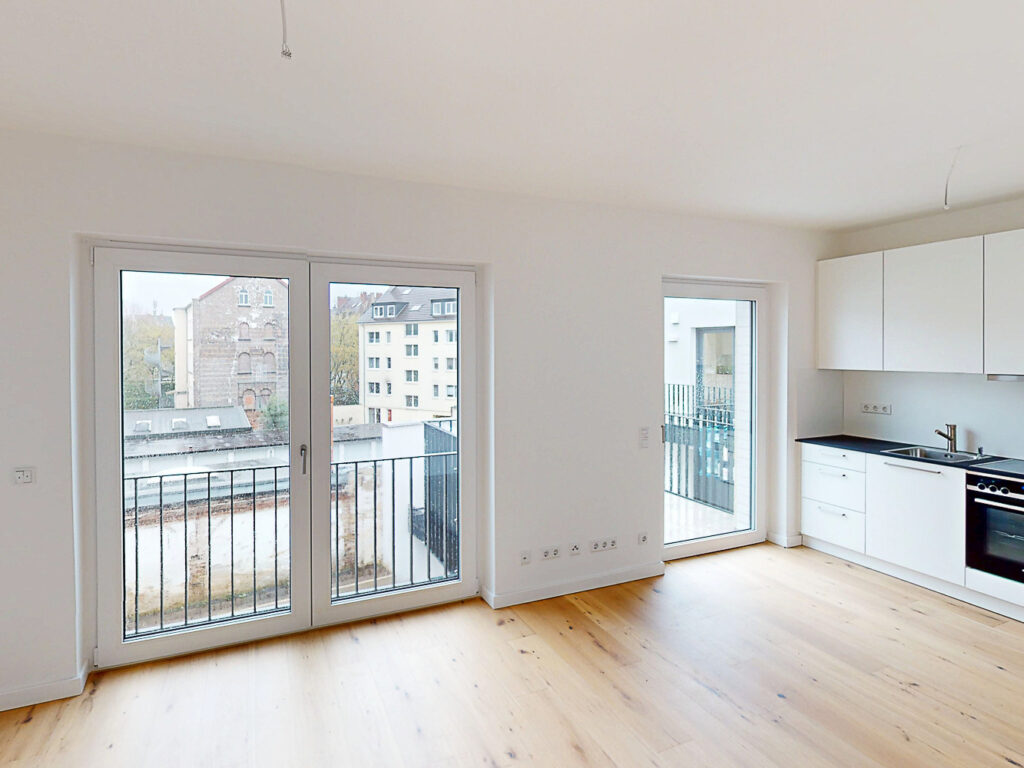 Erstbezug: Kompakte 3-Zimmer-Wohnung mit hochwertiger Einbauküche - Foto 2