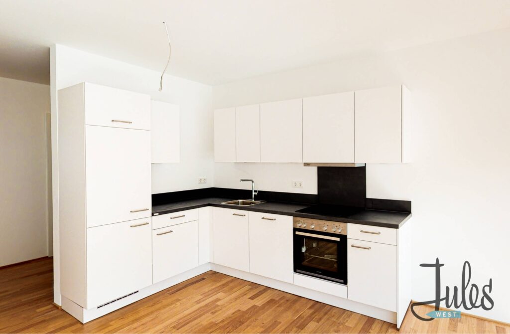 Städtisches Leben in zentraler Lage! 2-Zimmer-Wohnung mit EBK und Fußbodenheizung - Photo 4