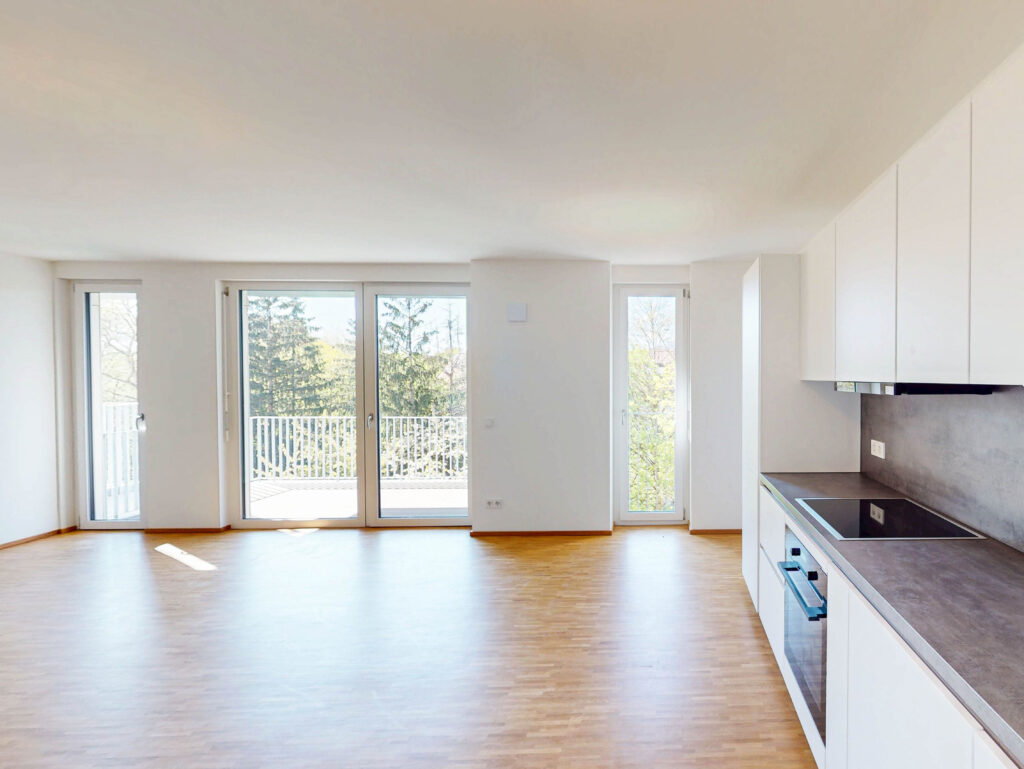 Ein Neubau für das Leben im Quartier mit großzügigem Wohnbereich und Balkon - Photo 1